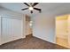 Bedroom with double door closet and bathroom access at 12610 Geneva Glade Dr, Riverview, FL 33578