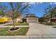 Two-story house with a two-car garage and a spacious driveway at 12610 Geneva Glade Dr, Riverview, FL 33578