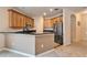 Kitchen with dark countertops and stainless steel appliances at 12610 Geneva Glade Dr, Riverview, FL 33578