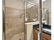 Large walk-in shower with tiled walls and seat at 12610 Geneva Glade Dr, Riverview, FL 33578