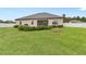 Large backyard with house and well-maintained lawn at 13008 Weatherstone Dr, Spring Hill, FL 34609