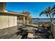 Private balcony with water views and tile flooring at 1302 Belcher Dr, Tarpon Springs, FL 34689