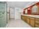 Bathroom with double vanity and a large walk-in shower at 1302 Belcher Dr, Tarpon Springs, FL 34689