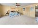 Bright bedroom with a king-size bed and carpet flooring at 1302 Belcher Dr, Tarpon Springs, FL 34689