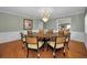 Formal dining room featuring a large wood table at 1302 Belcher Dr, Tarpon Springs, FL 34689