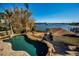 Relaxing pool area with spa and stunning waterfront views at 1302 Belcher Dr, Tarpon Springs, FL 34689