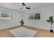 Spacious bedroom with large windows and soft rug at 1320 Dixie S Ln, St Petersburg, FL 33707