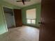 Bedroom with closet and window coverings at 1417 Murillo Loop, Ruskin, FL 33570