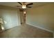 Bedroom with double door closet and access to bathroom at 156 Grand Ave, Brooksville, FL 34604