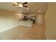 Open concept kitchen with granite countertops and stainless steel appliances at 156 Grand Ave, Brooksville, FL 34604