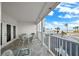 Relaxing balcony with ocean view and seating for four at 1582 Gulf Blvd # 1108, Clearwater Beach, FL 33767