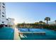 Two paddle tennis courts with benches and ocean views at 1582 Gulf Blvd # 1108, Clearwater Beach, FL 33767