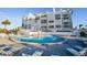 Circular pool with lounge chairs near a beachside building at 1582 Gulf Blvd # 1108, Clearwater Beach, FL 33767