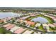 Aerial view showing home location in a community by a lake at 16051 Golden Lakes Dr, Wimauma, FL 33598