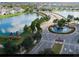 Aerial view of upscale community with lake, fountain, and luxury homes at 17048 Oval Rum Dr, Wimauma, FL 33598