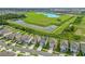 Community boasts a lagoon, lush landscape and homes at 17048 Oval Rum Dr, Wimauma, FL 33598