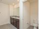 Double vanity bathroom with toilet at 17048 Oval Rum Dr, Wimauma, FL 33598