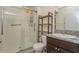 Bathroom with walk-in shower, toilet, vanity with granite countertop at 17048 Oval Rum Dr, Wimauma, FL 33598