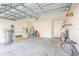 Spacious garage with bike storage and ample room for vehicles at 17048 Oval Rum Dr, Wimauma, FL 33598