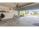 Bright and airy garage with open view to neighborhood at 17048 Oval Rum Dr, Wimauma, FL 33598