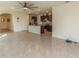 Open living room and kitchen with tile floors at 17048 Oval Rum Dr, Wimauma, FL 33598