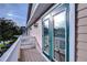 Private balcony with glass doors and a view of the community at 208 Elm View Ct, Brandon, FL 33511