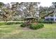 Quaint gazebo nestled in a lush green backyard at 208 Elm View Ct, Brandon, FL 33511