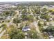 Wide aerial view showing house and surrounding neighborhood at 210 W Floriland Ave, Tampa, FL 33612