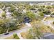 House nestled in a tree-lined neighborhood, seen from above at 210 W Floriland Ave, Tampa, FL 33612