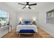 Serene bedroom with ceiling fan and stylish decor at 210 W Floriland Ave, Tampa, FL 33612