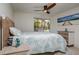 Bedroom with coastal decor and sliding glass door at 214 85Th St, Holmes Beach, FL 34217