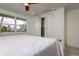 Bedroom with white bedding and built-in closet at 214 85Th St, Holmes Beach, FL 34217