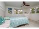 Bedroom with starfish bedding and white dresser at 214 85Th St, Holmes Beach, FL 34217