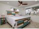 Main bedroom with rustic bed frame and ocean view at 214 85Th St, Holmes Beach, FL 34217