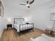 Cozy bedroom with ceiling fan and hardwood floors at 2242 22Nd S Ave, St Petersburg, FL 33712