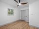 Bright bedroom with ceiling fan, new flooring, and ample closet space at 2242 22Nd S Ave, St Petersburg, FL 33712