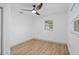 Well-lit bedroom featuring ceiling fan and light wood-look flooring at 2242 22Nd S Ave, St Petersburg, FL 33712