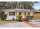 Renovated single story home with a red brick walkway at 2242 22Nd S Ave, St Petersburg, FL 33712