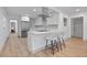 Modern white kitchen with stainless steel appliances and island at 2242 22Nd S Ave, St Petersburg, FL 33712