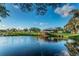 Serene pond with gazebo, surrounded by lush greenery at 2363 Israeli Dr # 25, Clearwater, FL 33763