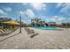 Expansive poolside patio with lounge chairs at 2363 Israeli Dr # 25, Clearwater, FL 33763