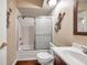 Bathroom with tub and decorative gecko at 2700 Nebraska Ave # 3-201, Palm Harbor, FL 34684