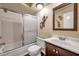 Bathroom with tub and decorative gecko at 2700 Nebraska Ave # 3-201, Palm Harbor, FL 34684