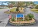 Attractive entrance to The Landings community at 2700 Nebraska Ave # 3-201, Palm Harbor, FL 34684