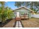 Home features a deck and walkway leading to the backyard at 2758 3Rd S Ave, St Petersburg, FL 33712