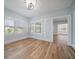 Bright dining room with light wood floors and neutral walls at 2758 3Rd S Ave, St Petersburg, FL 33712