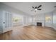 Living room with hardwood floors and fireplace at 2758 3Rd S Ave, St Petersburg, FL 33712