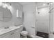 Updated bathroom with a walk-in shower and white vanity at 314 Barlow Ave # 73, Sarasota, FL 34232