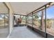 Screened porch overlooking a backyard landscape at 314 Barlow Ave # 73, Sarasota, FL 34232