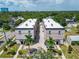 Aerial view of two-story townhouses with paved courtyard at 3421 W Horatio St # 109, Tampa, FL 33609